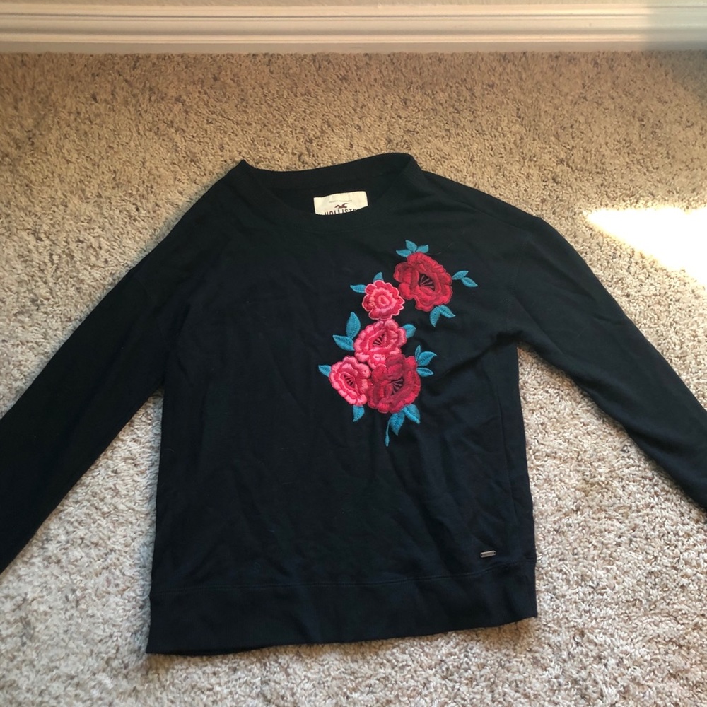 Black sweater with rose decal